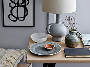 Serve it up in style with this 4-piece stoneware dish set. Dressed to impress with a debossed pattern and crackle glaze finish, these posh little plates offer a richly rustic way to dish out mini desserts or hors d’oeuvres.4-piece set | Made of stoneware/ceramic | Crackle glaze finish | Each plate is 3.5" round