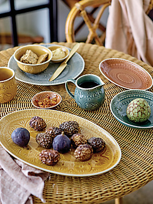 Serve it up in style with this 4-piece stoneware dish set. Dressed to impress with a debossed pattern and crackle glaze finish, these posh little plates offer a richly rustic way to dish out mini desserts or hors d’oeuvres.4-piece set | Made of stoneware/ceramic | Crackle glaze finish | Each plate is 3.5" round