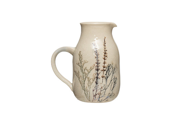 Whether hosting guests or enjoying family time around the table, use this floral stoneware debossed pitcher for quick drink refills. The essence of earthy elegance, this posh pitcher sports a delicate crackle finish sure to impress. What a way to pour on the charm.Made of stoneware/ceramic | Debossed/reactive crackle glaze | Holds 32 fluid ounces | 6-3/4 "l x 4-3/4" w x 7-3/4" h