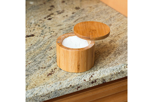 Place it on the counter by the stove. Leave it out on the table.  The  warm finish and  rich vertical graining of this bamboo salt box is guaranteed to  look just as good no matter where you display it. Equipped with a swivel operated lid, simply flick open the magnetic hinged top to grab spices while cooking, baking or seasoning.   Then nudge the lid shut to keep all the flavors in. The wide diameter top is just spacious enough to allow you to stick 3-4 fingers in to get that perfect pinch of salt while you cook. While great to use for salt, it’s also perfect for storing sugar, and other dried herbs or seasonings and even small office supplies and jewelry.Perfect for storing salt, gourmet salts, dried herbs and seasonings | Easy one-hand swipe lid keeps seasonings securely in place and accessible while prepping | Magnetic latch ensures flavors  stay in and dust and outside elements out | Made of eco-friendly bamboo