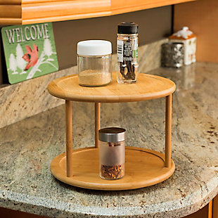 Stop wasting time rummaging through stuffed drawers and crowded cabinets to find what you need. This two-tier bamboo lazy Susan lets you keep handy all the things you need for cooking, like your favorite condiments and seasonings. This turntable features an all-natural bamboo finish that sits perfectly on any style of countertop. The smooth rotation makes it quick and easy to grab items, allowing you more time to focus on preparing (and enjoying) your meals.Made of bamboo | Neatly store condiments, seasonings and more | Simple design to fit any kitchen style | Easy to assemble