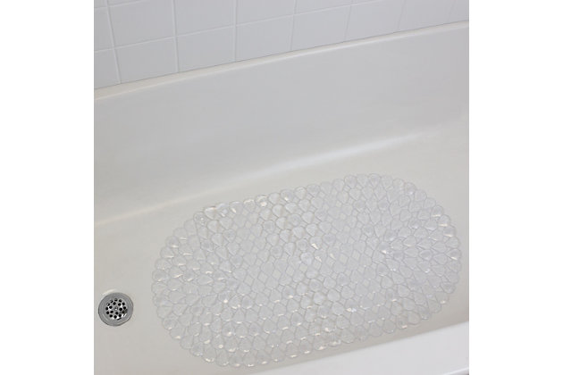 Pamper your feet with a touch of luxurious comfort by placing this clear diamond plastic bath mat in your tub. The back of the mat features strong and sturdy suction cups, to reduce slipping when getting in and out of the tub. Featuring an ornate cut-out diamond pattern, it allows water to freely pass through for quick and efficient draining. The versatile design makes it great not only for the tub but also the shower and other smooth, slippery surfaces. Constructed of durable plastic, it's beautiful and easy to maintain.Clear | Sturdy non-slip plastic | Soft surface for long-lasting comfort on your feet | Intricate diamond cut-out design allows water to flow through for quick, efficient drying | Multiple strong suction cups grip firmly to base of tub to prevent sliding and shifting | Wash with mild soap and rinse with warm water to maintain sparkling condition