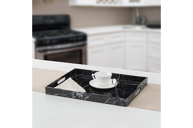 Set a stylish stage for your prized possessions with this chic vanity tray. Designed with striking veining, it's made from black faux marble to give the look of the real thing without the heft. Place it on your bathroom vanity as an exquisite showcase for perfumes, jewelry or bath accessories. Take your decor up a notch by matching this piece with our faux marble bath accessories for a coordinated look. Or set it atop the countertop to corral loose change and mail. Whether your bathroom leans toward contemporary or traditional, this vanity tray will complement any bath with its vivid detailing, shape and classic color.Made of durable black faux marble | Perfect to display on a bathroom vanity as a makeup organizer; place on an ottoman as a beautiful decorative tray | Design gives the look of real marble without the bulk | Ideal for storing collectibles, perfumes and other bath essentials