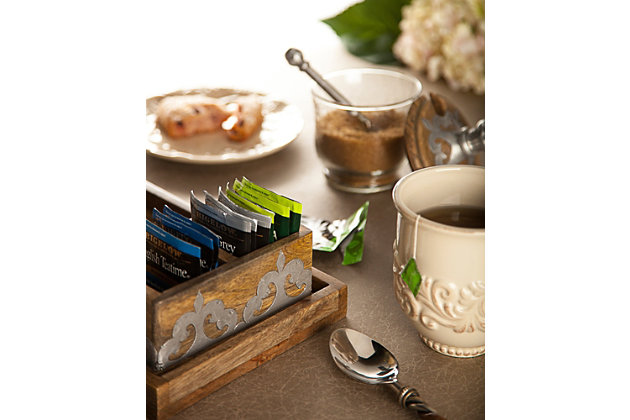 Elevate your afternoon tea or after-dinner coffee to special-occasion status with the Old-World style with this cream and sugar set. The intricately hand crafted metal inlaid wooden tray can even hold a small plate of cheese, cookies, or other treats to accompany your coffee or tea hour. The set includes a sugar bowl with beautiful wood and metal finial lid, stylish glass creamer, artful cast spoon, a seperated box for sweeteners and tray. Crafted with exceptional quality and flair with the Heritage Collection ornate design, this set will make every dining experience a grand occasion!Stunning cream and sugar set of inlaid wood includes a covered  glass sugar bowl, glass creamer, spoon, seperated sweetener box and tray | All the pieces of this set fit neatly on the 14-inch long tray that could also be used to serve culinary tidbits of confection for tea, or use as an ornate cheese board | High quality mango wood is medium brown and finely grained, with hand inlaid metal work in a beautiful scroll it is  classic of vintage european style | The artfully designed glass pitcher and glass sugar bowl can be cleaned in a  dishwasher for convienence | Use these pieces together or separately foran  attractive addition to your kitchen serviceware and décor