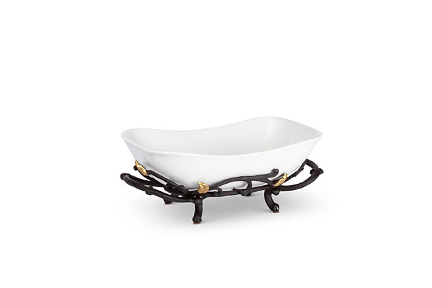 Our Gold Leaf Stoneware serving bowl sits in a lovely metal base with handles making passing vegetables, pasta or any dish easy for entertaining.Item measures 12"l x 7.75"w x 5"h | White rectangular-shaped stoneware serving bowl. | The gold leaves are delicately placed to add subtle and understated beauty to any taste. | Base has handles for easy lifting. | Food-safe.