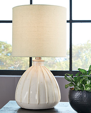 Illuminate your space with the Grantner table lamp. The smooth glazed surface ads subtle artistic ambiance, while a beige fabric shade completes the tasteful silhouette. You'll love the bright and beautiful glow that this table lamp brings to your home.Made of ceramic with drum hardback fabric shade | Off-white glazed finish | On/off inline switch | 1 E26 socket; type A bulb recommended (not included); 40 watts max or CFL 8 watts max; UL listed | Assembly required | Estimated Assembly Time: 15 Minutes