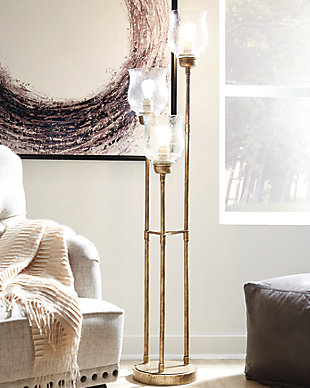 With the Emmie floor lamp, stand-up style is a no brainer with its goldtone metal and glass shades. Varying height bulbs cascade light for maximum impact beside an accent chair or mirror. No more fumbling around in the dark—the easy foot switch simplifies adding extra light to the room whenever you need it.Made of antiqued goldtone metal with glass shades | On-off foot switch | 3 type A bulbs (not included); 40 watts max or CFL 8 watts max; UL Listed | Assembly required | Clean with a soft, dry cloth | Estimated Assembly Time: 15 Minutes