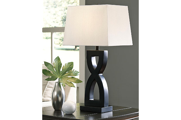 Make a bold and beautiful statement with the Amasai table lamp. Structured hardback shade and sculptural base are the perfect pairing for a clean-lined, ultra-contemporary look.Made of resin with rectangular hardback shade | 3-way switch | 1 type A bulb (not included); 150 watts max or 25 watts max CFL; UL Listed | Clean with a soft, dry cloth | Assembly required | Estimated Assembly Time: 15 Minutes