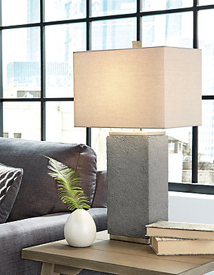 Faux concrete and a brushed silver finish set the Amergin table lamp apart from the rest. It’s contemporary and chic and will show off your eclectic taste.Made of poly resin and metal with fabric hardback shade | 3-way switch | 1 type A bulb (not included); 150 watts max or CFL 25 watts max; UL Listed | Clean with a soft, dry cloth | Assembly required | Estimated Assembly Time: 15 Minutes