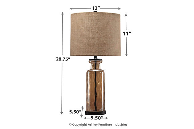 Transparency is in style with the Laurentia table lamp. A unique pattern reflects in the faceted base as light passes through. Antique bronze-tone metal beautifully complements the champagne glass finish. Burlap shade adds texture to the smooth design.Made of glass and metal with fabric drum shade | 3-way switch | 1 type A bulb (not included); 100 watts max or CFL 23 watts max; UL Listed | Clean with a soft, dry cloth | Assembly required | Estimated Assembly Time: 15 Minutes