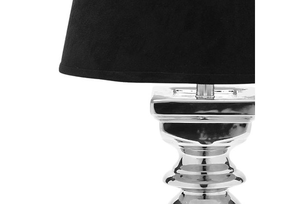 Modeled after the style of classic European balusters, this table lamp set adds soft, lustrous light that's a welcome addition to a living room side table or bedroom nightstand. Shimmery silvertone base is paired with a black velvet hardback shade for upscale flair.Set of 2 | Made of ceramic with fabric shade | On/off switch | Cfl bulb; 13-watt bulb included | Wipe with a soft, dry cloth; avoid use of chemicals and household cleaners as they may damage finish | Assembly required