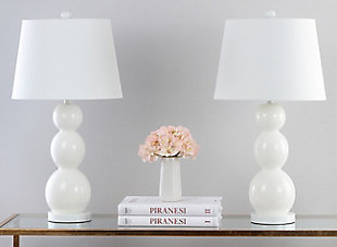 A perfect balance of form and function, this graceful, modern table lamp features three high-sheen glass balls that graduate in size. With matching fittings and slightly tapered cotton shade that gently filters light. Sold as a set of two.Set of 2 | Made of glass with fabric shade | On/off switch | Cfl bulb; 13-watt bulb included | Wipe with a soft, dry cloth; avoid use of chemicals and household cleaners as they may damage finish | Assembly required