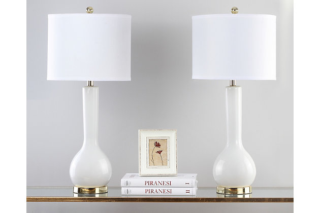 Inspired by a classic pottery form, this single gourd ceramic lamp with extra-long neck lends a stately but contemporary presence in any room. Brushed goldtone base, neck and finial enhance the upscale aesthetic. Crisp off-white cotton drum shade is a fresh choice.Set of 2 | Made of ceramic with fabric shade | On/off switch | Cfl bulb; 13-watt bulb included | Wipe with a soft, dry cloth; avoid use of chemicals and household cleaners as they may damage finish | Assembly required