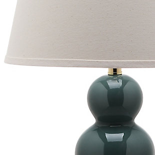 Illuminate your living room, bedroom or family room in a contemporary way with this triple gourd table lamp. Shapely ceremic base is topped with a clean and simple off-white fabric shade for a fresh complement. Sold as a set of two.Set of 2 | Made of ceramic with fabric shade | On/off switch | Cfl bulb; 13-watt bulb included | Wipe with a soft, dry cloth; avoid use of chemicals and household cleaners as they may damage finish | Assembly required