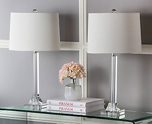 Are you a fan of Old Hollywood glam? Then you’re sure to find this classic column table lamp a picture-perfect addition to your space. Crafted with crystal and topped with a white drum shade for a timeless touch. Sold as a set of two.Set of 2 | Made of crystal with chrome-tone metal and fabric shade | On/off switch | Cfl bulb; 13-watt bulb included | Wipe with a soft, dry cloth; avoid use of chemicals and household cleaners as they may damage finish | Assembly required
