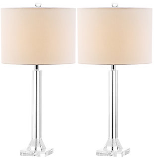 Are you a fan of Old Hollywood glam? Then you’re sure to find this classic column table lamp a picture-perfect addition to your space. Crafted with crystal and topped with a white drum shade for a timeless touch. Sold as a set of two.Set of 2 | Made of crystal with chrome-tone metal and fabric shade | On/off switch | Cfl bulb; 13-watt bulb included | Wipe with a soft, dry cloth; avoid use of chemicals and household cleaners as they may damage finish | Assembly required