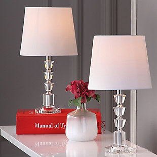 Crystal vision. A clear choice for those with a modern sensibility, this crystal table lamp with faceted crystal orb base masters the art of understated elegance. Touches of chrome-tone metal and a crisp linen shade perfect the aesthetic.Set of 2 | Made of crystal and chrome-tone metal with fabric shade | On/off switch | Cfl bulb; 13-watt bulb included | Wipe with a soft, dry cloth; avoid use of chemicals and household cleaners as they may damage finish | Assembly required