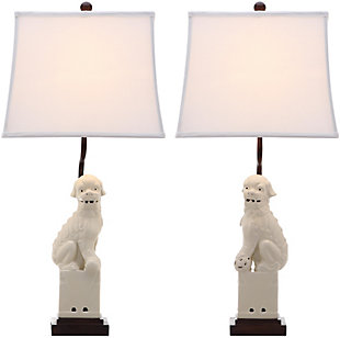 With a nod to the Far East, these stately foo dog table lamps add a worldly touch to any room.  Delightfully different, they're crafted of ceramic with pure cotton shades and contrasting brown stand and fittings.Set of 2 | Made of crystal and resin with fabric shade | On/off switch | Cfl bulb; 13-watt bulb included | Wipe with a soft, dry cloth; avoid use of chemicals and household cleaners as they may damage finish | Assembly required