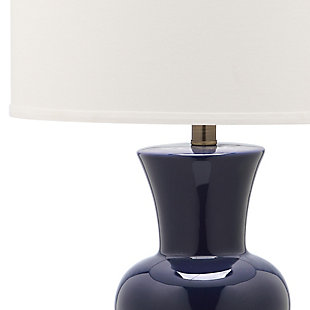 Perk up any room in the house with the young but sophisticated column lamp. With navy blue ceramic hourglass base cinched in the center and contrasting bronze base and fittings, this colorful set of two lamps is contrasted with crisp off-white shades.Set of 2 | Made of ceramic with fabric shade | 1 type a bulb (not included); 40 watts max or cfl 13 watts max | Assembly required | Clean with a soft, dry cloth