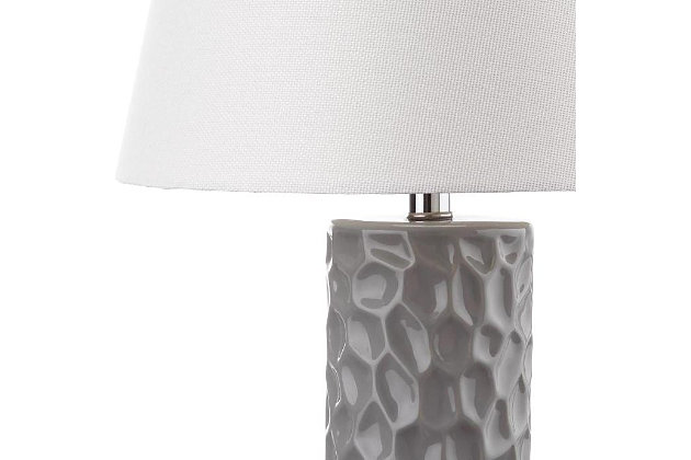 Infinitely versatile and adaptable to a myriad of decorating styles, this textural table lamp features the iconic column design in a gray finish. Updated with an acrylic base and a shade in white textured cotton, it creates a focal point in any room.Set of 2 | Made of ceramic with cotton shade | 1 type a bulb (not included); 40 watts max or cfl 13 watts max | Assembly required | Clean with a soft, dry cloth