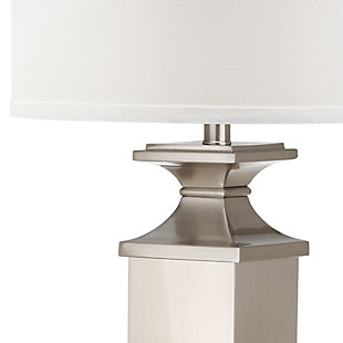 A satiny brushed nickel-tone finish lends an opulent effect to this classically shaped table lamp.  A graceful urn silhouette is updated for transitional rooms with a crisp white cotton drum shade.Set of 2 | Made of metal with cotton shade | 1 type a bulb (not included); 40 watts max or cfl 13 watts max | Assembly required | Clean with a soft, dry cloth