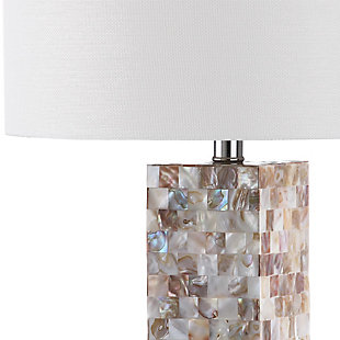 Fresh as an ocean breeze, this shell lamp adds just the right touch of glimmer beside a sumptuously decorated bed, or sophisticated sofa or chair. Crafted of natural capiz shell, the rectangular base is accented with a silvertone neck and an ivory cotton shade.Set of 2 | Made of shell with cotton shade | 1 type a bulb (not included); 40 watts max or cfl 13 watts max | Assembly required | Clean with a soft, dry cloth