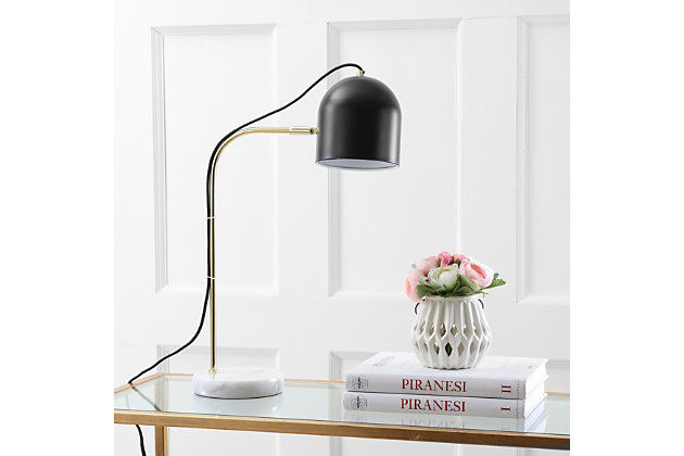 Designed to shine light exactly where it’s needed, this contemporary table lamp is a new classic. Inspired by the home of an art curator, a white marble base supports a sleek black and goldtone body. Possessing perfect proportions, use it to highlight small spaces in the living room, bedroom or home office.Made of marble and iron with metal shade | 1 type a bulb (not included); 60 watts max or cfl 13 watts max or led 9 watts | Assembly required | Clean with a soft, dry cloth