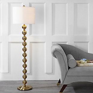 The homes and movie sets of Old Hollywood inspired this posh stacked-ball floor lamp. Its shining brass-tone base and white cotton drum shade add instant glamour to any interior.Made of metal with fabric shade | Aged brass-tone finish | 1 spiral CFL E-26; 13-watt max bulb | On/off switch | Wipe with a soft, dry cloth; avoid use of chemicals and household cleaners as they may damage finish | Assembly required