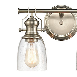 Whether you delight in modern farmhouse, industrial or contemporary design, you’re sure to find this posh vanity light looks right at home. Quality crafted of sturdy steel in a satin nickel-tone finish with spun socket holder with oversized thumbscrews for a mechanical aesthetic. Seeded glass makes for lovely light diffusion.Made of steel and glass | Led compatible | Uses 2 bulbs (60-watt max); not included | Hardwired; professional installation recommended | Assembly required