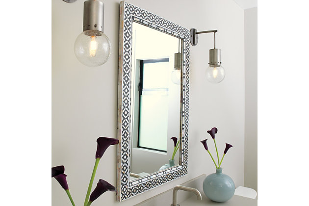 Art meets industrial in this striking wall sconce light fixture. Gunmetal steel is paired with a suspended seeded glass globe for a touch of drama. Damp-rated design makes it an exceptional choice for powder rooms and covered porches, too.Made of gunmetal gray steel and seeded glass | 40-watt bulb (not included); candelabra base (E-12) | Damp-rated design approved for use in covered outdoor areas and bathrooms | Hardwired; professional installation recommended | Assembly required