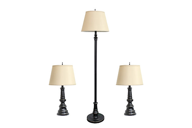 Accessorize your space with this tastefully designed lamp set. It includes 2 table lamps and 1 floor lamp, each with a tan fabric shade to make beautifying your home a cinch! Each lamp is enriched with an exquisite Restoration Bronze finish. 
We believe that lighting is like jewelry for your home. Our products will help to enhance your room with elegance and sophistication.Set includes 2 table lamps and 1 floor lamp | Beautiful tan fabric shades and exquisite restoration bronze  finish | Table lamps: h: 26”   shades diameter: 13.5" | Floor lamp: h: 60.5”  shade diameter: 14.5”