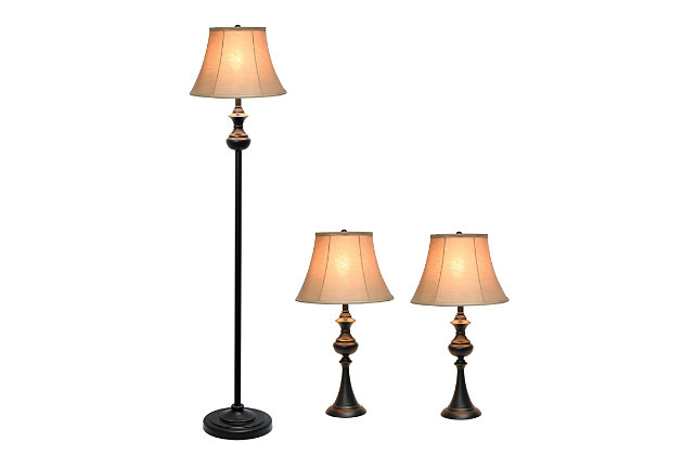 As trends change throughout the years, sometimes it is best to have a few pieces of furniture that will survive years of transitions, like this table and floor lamp 3 pack set.  It includes two table lamps and one floor lamp, each with curved and winding bases showcasing the right amount of detail, without overriding it's simplicity. Matched with a tan fabric empire shade, this set is bound to remain among your timeless favorites!Set includes 1 floor lamp and two table lamps | Restoration bronze painted finish on metal lamp bases | Tan bell shaped fabric shades | Each uses 
1 x 100w 3-way type a medium base bulb (not included)
