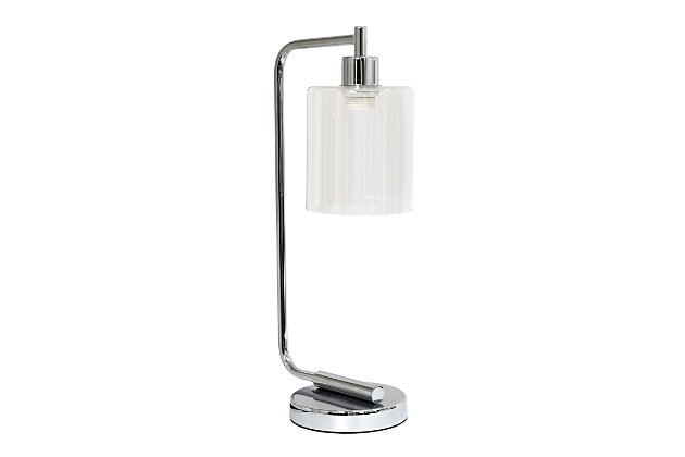 The sophistication of industrial accents gleams in this beautifully crafted iron desk lamp. The humble design combines a simple base with curved arm and a clear glass shade for the perfect ensemble. Place on a desk or bedside table for a modest, refined look in fashion lighting. **HELPFUL TIP: To get the complete industrial look, we recommend using a decorative Edison/Vintage bulb (not included). **Exquisite chrome finish | Clear glass shade | Convenient on/off cord switch | Lamp measures: l:9" x w:5" x h:19"