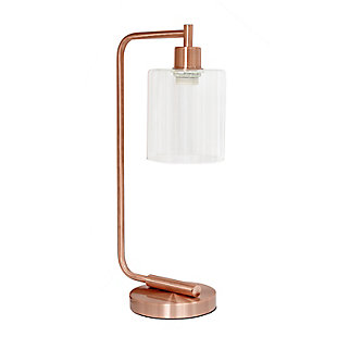 The sophistication of industrial accents gleams in this beautifully crafted iron desk lamp. The humble design combines a simple base with curved arm and a clear glass shade for the perfect ensemble. Place on a desk or bedside table for a modest, refined look in fashion lighting. **HELPFUL TIP: To get the complete industrial look, we recommend using a decorative Edison/Vintage bulb (not included). **Exquisite rose gold (copper) finish | Clear glass shade | Convenient on/off cord switch | Lamp measures: l:9" x w:5" x h:19"