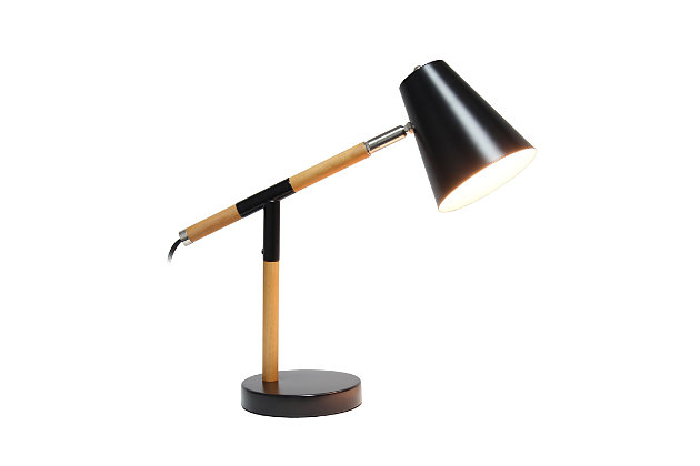 Simple yet modern this desk lamp will add a stylish touch to your home, dorm or office!  The conical shade can be easily adjusted 180 degrees that allows easy focusing of light where needed the most. Made of mixed materials, this lamp is on trend!Matte black base with  wood accents | Metal shade | Easily accessible rotary switch located on the cord | Uses 1 x 40w medium type a base bulb (not included)