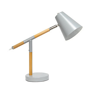 Simple yet modern this desk lamp will add a stylish touch to your home, dorm or office!  The conical shade can be easily adjusted 180 degrees that allows easy focusing of light where needed the most. Made of mixed materials, this lamp is on trend!Matte gray base with  wood accents | Metal shade | Easily accessible rotary switch located on the cord | Uses 1 x 40w medium type a base bulb (not included)