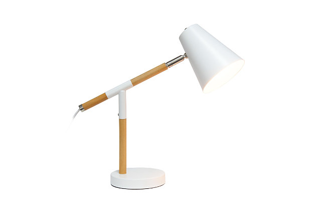 Simple yet modern this desk lamp will add a stylish touch to your home, dorm or office!  The conical shade can be easily adjusted 180 degrees that allows easy focusing of light where needed the most. Made of mixed materials, this lamp is on trend!Matte white base with  wood accents | Metal shade | Easily accessible rotary switch located on the cord | Uses 1 x 40w medium type a base bulb (not included)