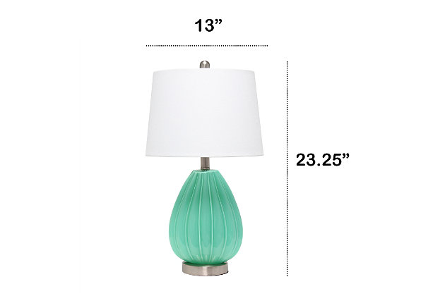 Illuminate your space with this chic and charming table lamp.  The seafoam glass base is curvy and accentuated with a pleated design topped off with a white fabric shade.   Perfect for your living room, bedroom, office, or anywhere you need to add a tasteful update!Fabric white shade | Pleated seafoam glass base | 1 x 60w medium type a base bulb (not included) required | More base color options available!