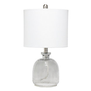 With a textured glass base and white fabric drum shade, this lamp is sure to update any room in your home with a little charm.  This lovely lamp is crafted with an open bottom glass base in a transparent gray color. Perfect for adding the little refresh to your living room, bedroom, foyer or office that you've been looking for!Fabric white shade | Transparent gray glass base | 1 x 60w medium type a base bulb (not included) required | More shade color options available!