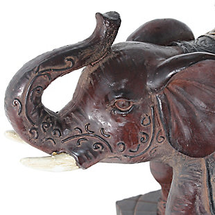 Add a touch fo luxury to any room in your home with this stylish elephant lamp.  The brown resin base is detailed with hints of gold and topped off with a tapered brown fabric shade.  Perfect for your living room, bedroom, office or kids room!Fabric brown shade | Brown resin base with hints of gold detail | 1 x 60w medium type a base bulb (not included) required | 5 foot brown cord