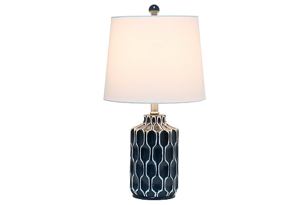 Enhance any room in your home with this contemporary table lamp.  The blue base features a simple yet stylish handpainted white design and is complimented by a white fabric shade.  Perfect for adding the little refresh to your living room, bedroom, foyer or office that you've been looking for!Fabric white shade | Handpainted white design on a blue resin base | 1 x 60w medium type a base bulb (not included) required | 5 foot clear cord