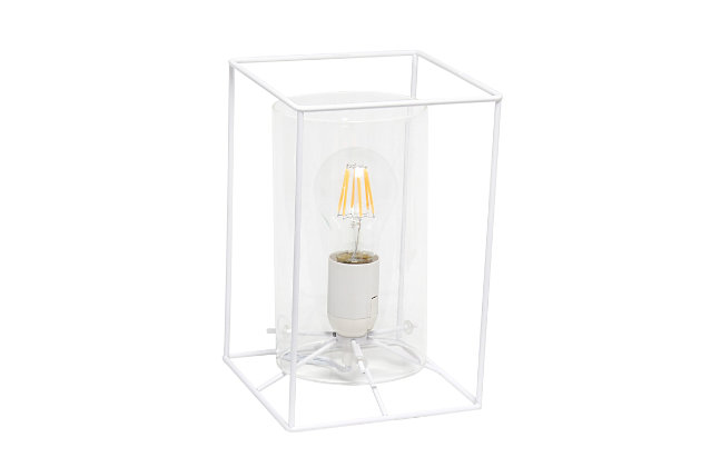 This table lamp features a white metal frame with a clear glass shade that will illuminate any room in style!  The simple, clean lines of the frame is complimented by the rounded cylinder shade offering a chic sophisticated look.  Perfect for your living room, bedroom, office, apartment or college dorm!

**HELPFUL TIP: To get the complete industrial look, we recommend using a decorative Edison/Vintage bulb (not included). **Cylindrical clear glass shade | Rectangular white metal frame | 1 x 40w medium type a base bulb (not included) required

for full vintage look, type t45 edison bulb is recommended | 5 foot white cord