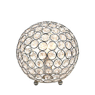 Make your room sparkle with a shining ball of crystals. The perfect addition to any bedroom, office, nursery, or even a foyer or entryway! We believe that lighting is like jewelry for your home. Our products will help to enhance your room with elegance and sophistication.Crystal ball shape glows from within casting pretty shadows | Threaded with steel rings and set on ball feet | Chrome plated finish | Height: 8" diameter: 7.75"
