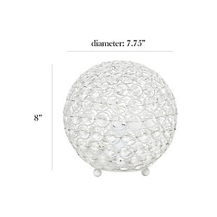 Make your room sparkle with a shining ball of crystals. The perfect addition to any bedroom, office, nursery, or even a foyer or entryway! We believe that lighting is like jewelry for your home. Our products will help to enhance your room with elegance and sophistication.Crystal ball shape glows from within casting pretty shadows | Threaded with steel rings and set on ball feet | White finish | Height: 8" diameter: 7.75"