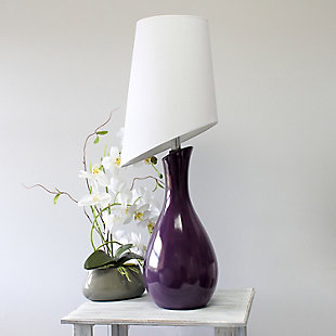 Add a contemporary flair to any room with this lovely tall curved table lamp. The eggplant color helps to create this fresh look. The asymmetrical white fabric shade completes the ensemble. Perfect lamp for a bedroom, living area, office, kid's room, or college dorm. We believe that lighting is like jewelry for your home. Our products will help to enhance your room with chic sophistication.Asymmetrical white fabric shade | Deep eggplant purple color | Curvy base | Height: 28.5" slanted shade diameter: 11"
