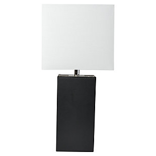 This simple yet modernized table lamp showcasing a leather body and white fabric shade is the perfect addition to your lighting needs. With a USB port on the side of the base, you are able to conveniently plug and/or charge your devide. Our products are designed to enhance your room with elegance and sophistication.Leather wrapped base with usb port | White fabric shade | Assembled dimensions: l: 10" x w: 6" x h: 21" | Uses 1 x 60w type a base bulb (not included)