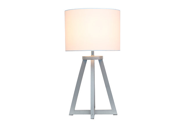 Add a touch of simplicity to your home with this contemporary lamp. The soft, white fabric shade compliments the geometric gray wood base for a clean, simple look.  Perfect lamp for a bedroom, living area, office, kid's room or college dorm.Gray wood base | White fabric shade | Easily accessible on/off switch located on the cord | Uses 1 x 40w medium type a base bulb (not included)