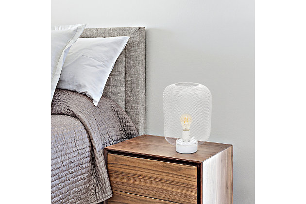 This metal table lamp with mesh shade will add ambiance and style to any room in your home!  With a simple, lattice cut out design this lamp illuminates beautifully.  Undoubtedly the perfect accent piece to your home, this industrial lamp will not disappoint! 

**HELPFUL TIP: To get the complete vintage look, we recommend using a decorative Edison/Vintage bulb (not included). **White metal base | White mesh metal shade | Easily accessible on/off switch located on the cord | Uses 1 x 40w medium type a base bulb (not included)

for full vintage look, type t45 edison bulb is recommended