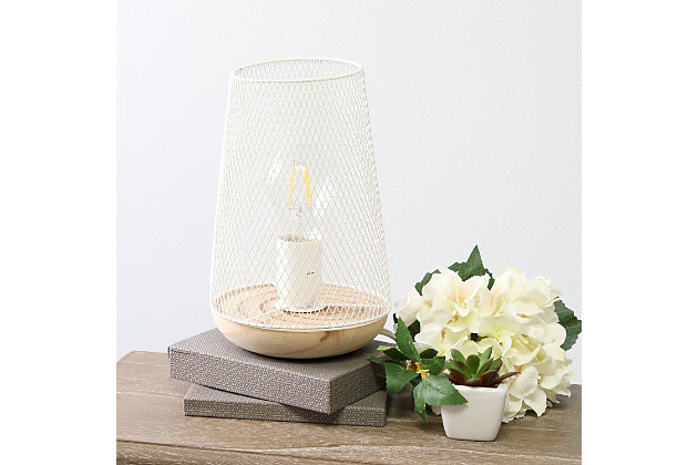 This metal table lamp with mesh shade will add ambiance and style to any room in your home!  With a simple, lattice cut out design and natural wood base this lamp illuminates beautifully.  Undoubtedly the perfect accent piece to your home, this industrial lamp will not disappoint! 

**HELPFUL TIP: To get the complete vintage look, we recommend using a decorative Edison/Vintage bulb (not included). **Natural wood base | White mesh metal shade | Easily accessible on/off switch located on the cord | Uses 1 x 40w medium type a base bulb (not included)

for full vintage look, type t45 edison bulb is recommended