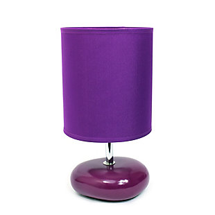 A fun, inexpensive, and practical table lamp to meet your basic fashion lighting needs. This small lamp features a stone shaped ceramic base and matching fabric shade. The compact size of this lamp makes it the perfect bedside counterpart.Small stone shaped ceramic base | Matching fabric shade | Perfect for bedroom, kids room, or college dorm | Height: 10.24" shade diameter: 5.5"